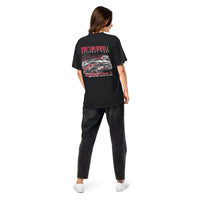 Thumbnail for Person wearing a black t-shirt with a graphic design on the back, standing against a white background
