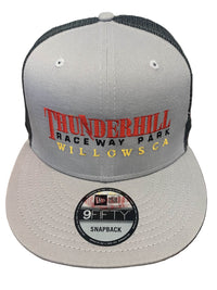 Thumbnail for Gray and black snapback cap with 'Thunderhill Raceway Park' text on a wooden surface.