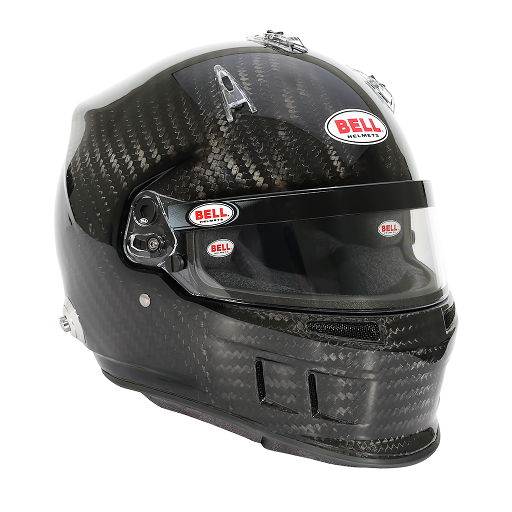 Bell XR7 Carbon SA2025 Snell certified helmet with visor down on pit lane