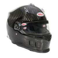 Thumbnail for Bell XR7 Carbon SA2025 Snell certified helmet with visor down on pit lane