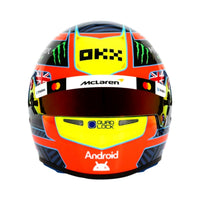 Thumbnail for Oscar Piastri 2026 F1 mini helmet front view with bright McLaren-inspired livery and tinted visor